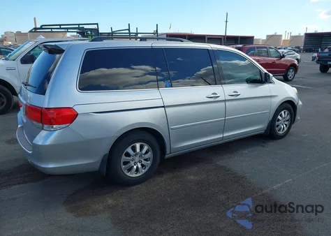 2010 Honda Odyssey Ex-L z USA, uszkodzony, nr VIN 5FNRL3H79AB039173